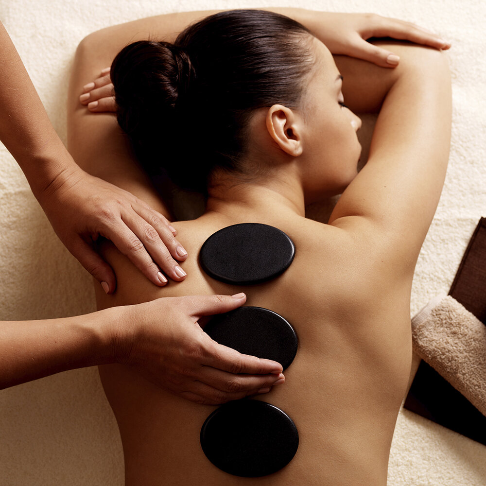 What Are the Wellness Advantages of a Hot Stone Massage Therapy?
